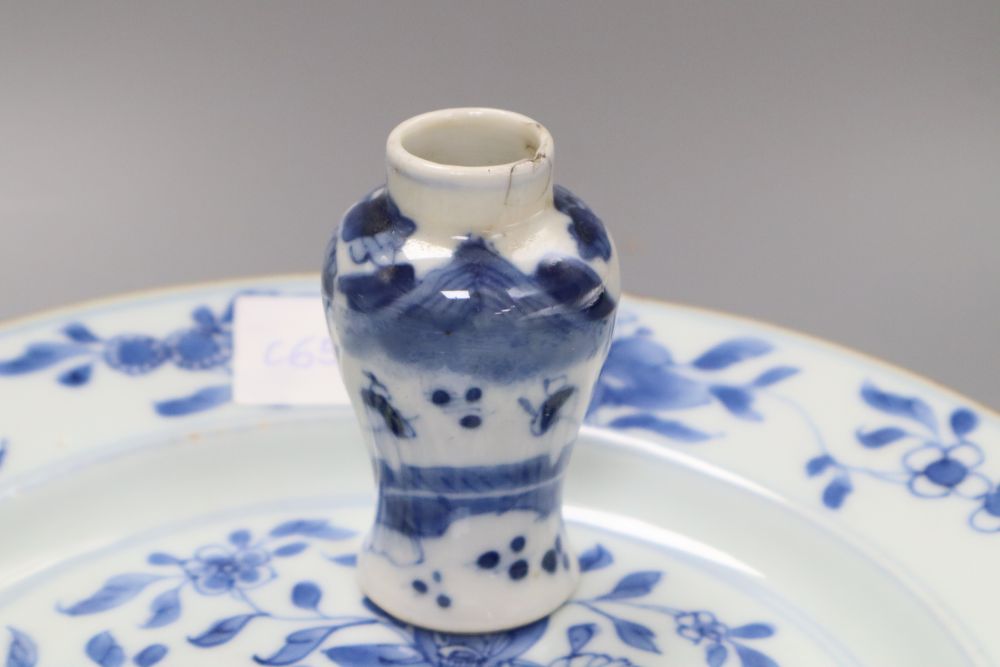 Two Chinese blue and white export plates, a blue and white miniature vase, a dish and bowl